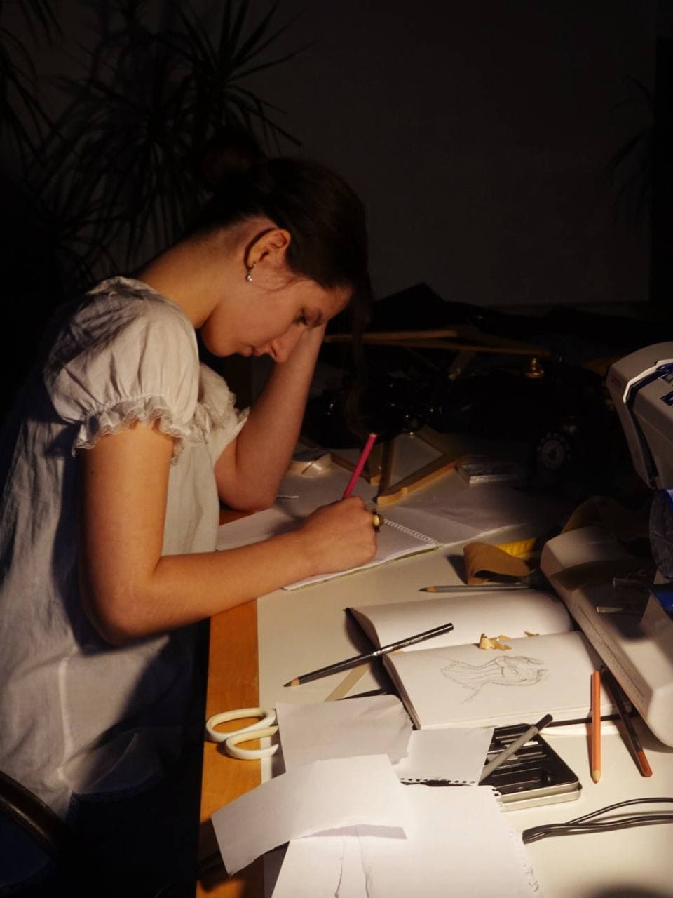 Ieva drawing at the table