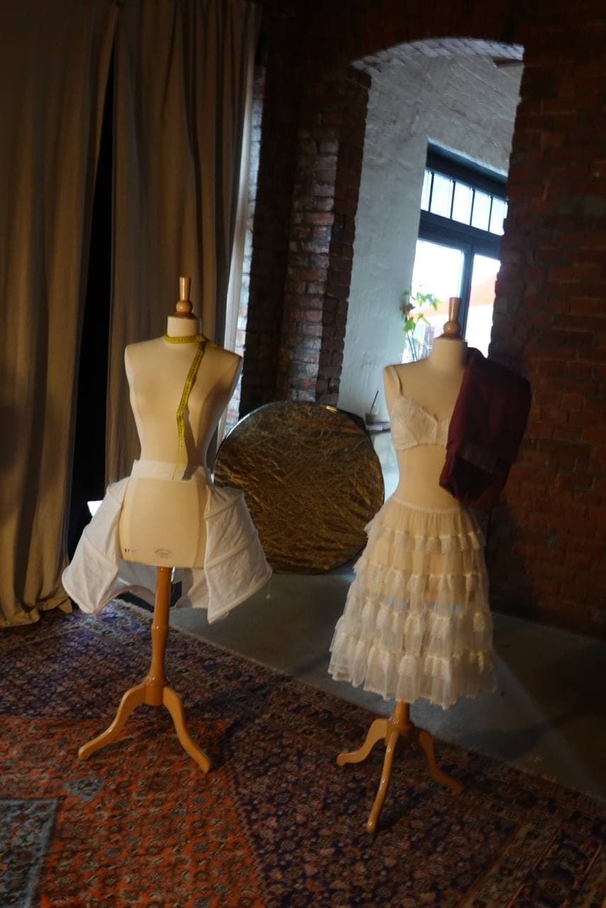 Studio light — mannequins and drapes